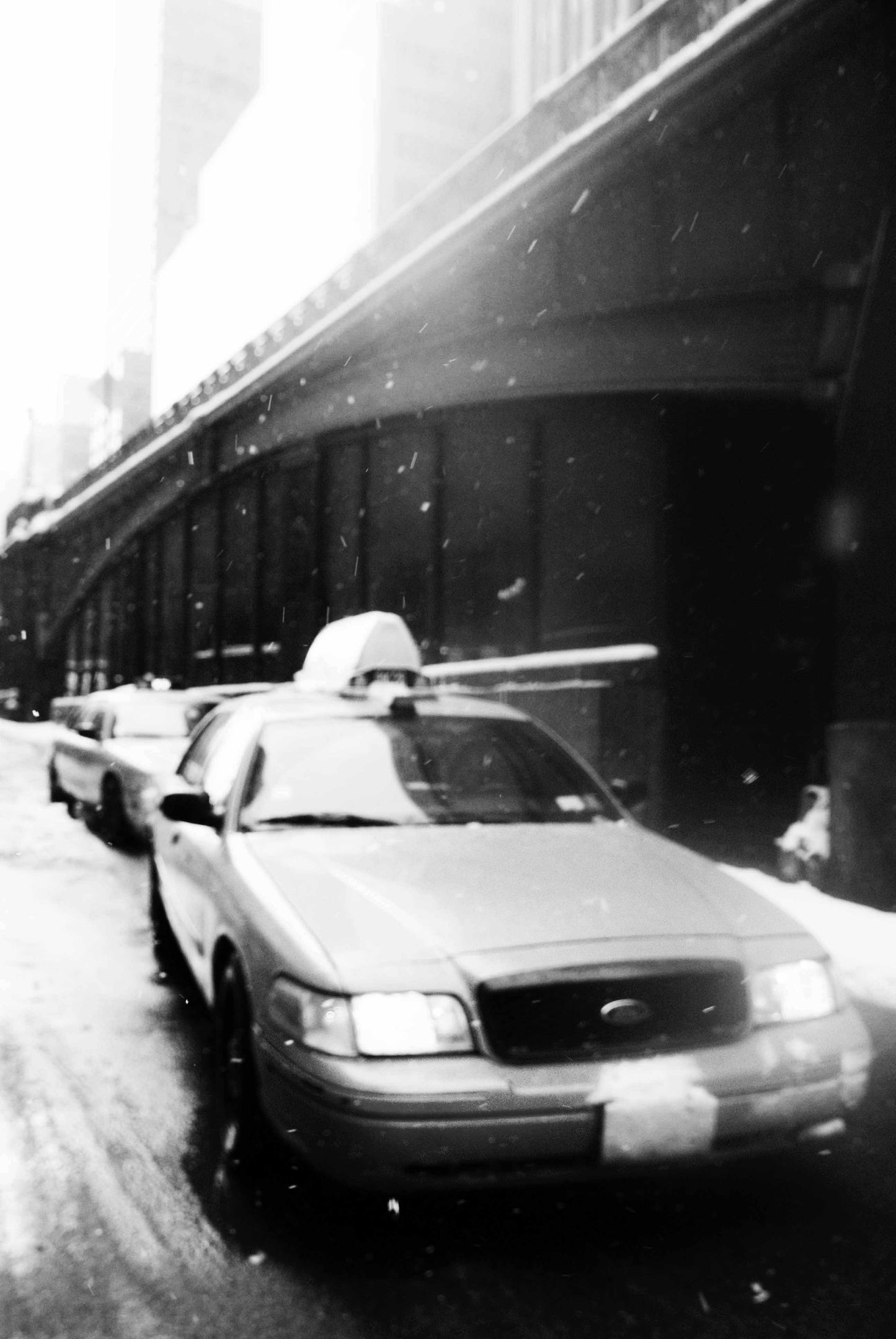 The ubiquitous New York yellow taxi on a wintery street in the city
