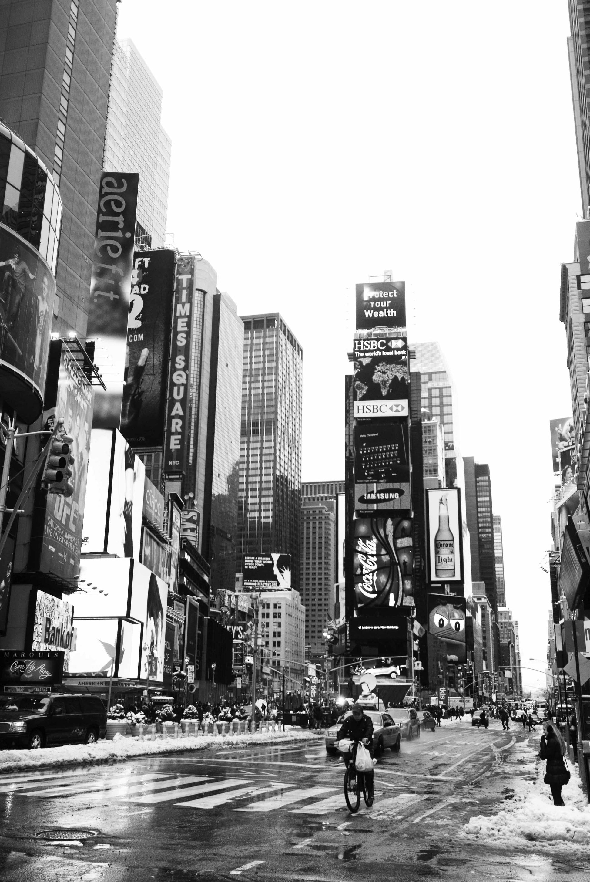 The bustle of everyday life continues through New Yorks iconic Times Square