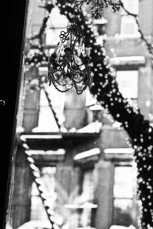 Festive decorations hang outside the famous Cafe Lalo in Manhattan