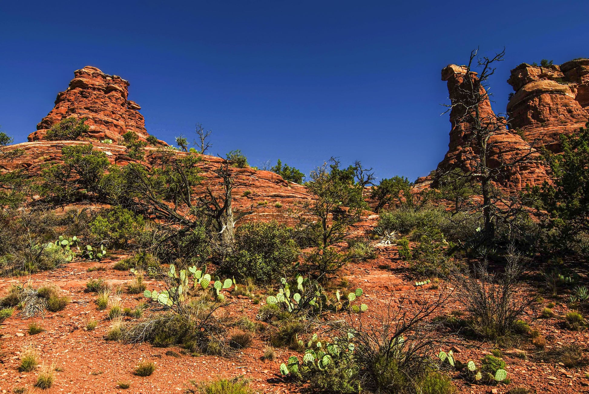 Alessandra Mattanza | ENCHANTMENT, Kachita Woman, Sedona, Arizona, USA. The Kachita Woman Rock overlooking Boyton Canyon in Sedona. Available as an art print or as a photographic print on acrylic glass.