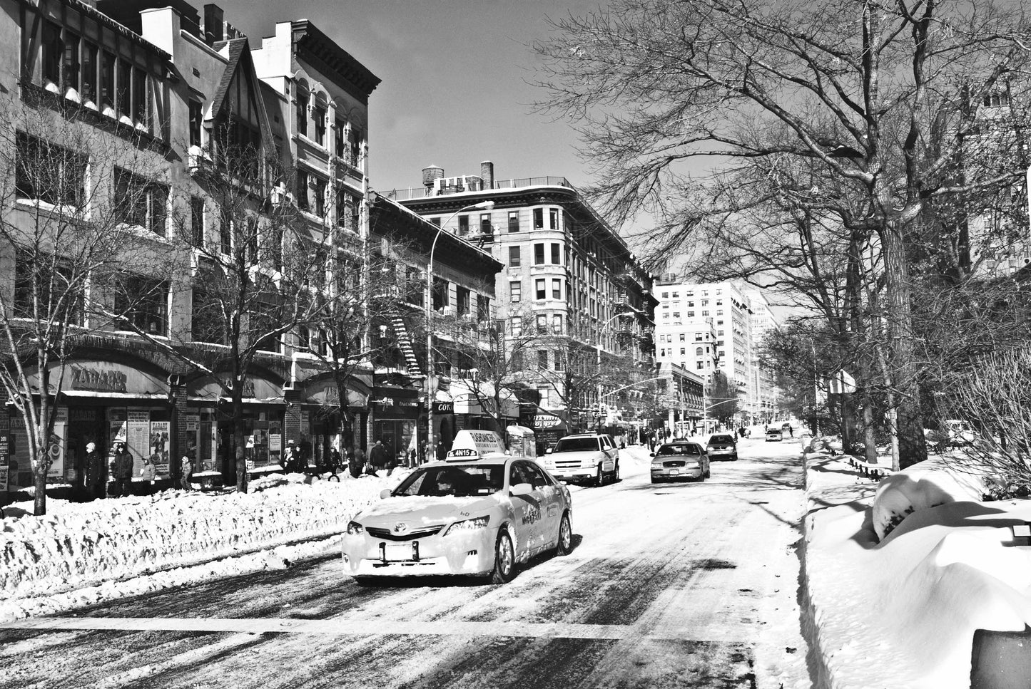 The winter sun shines on a snowy street scene from New Yorks Upper West Side