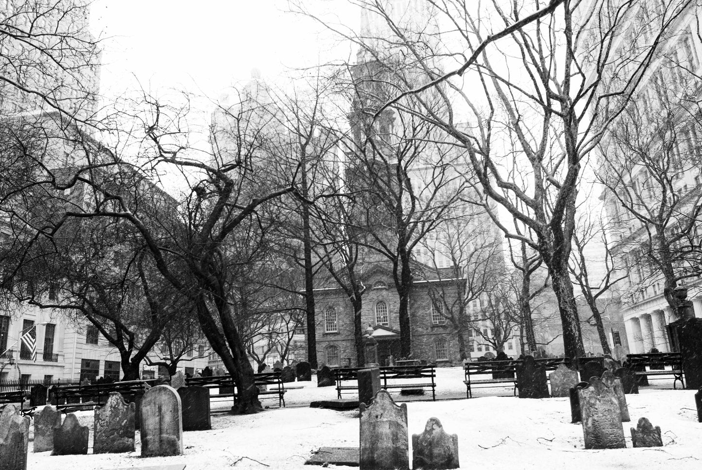 Alessandra Mattanza | LIGHT AND DARKNESS, New York. Winter shrouds this quiet cemetary in New York. Available as an art print or a photographic print on acrylic glass.