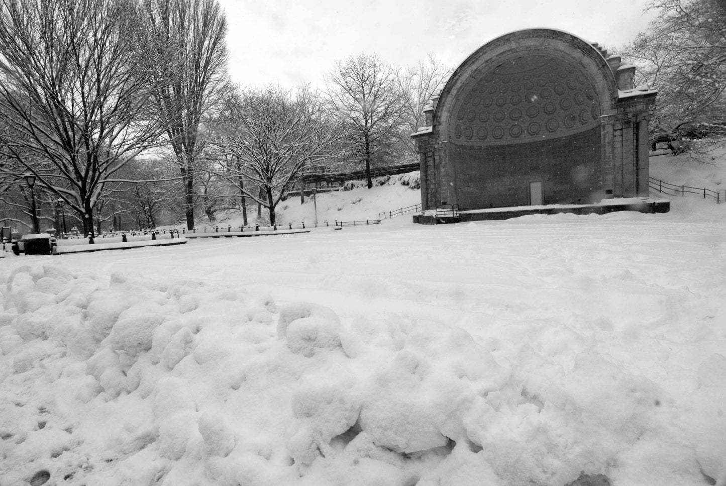 The Naumburg Bandshell is the centerpiece of this winter scene in New Yorks Central Park. Available as an art print or as a photographic print on acrylic glass.