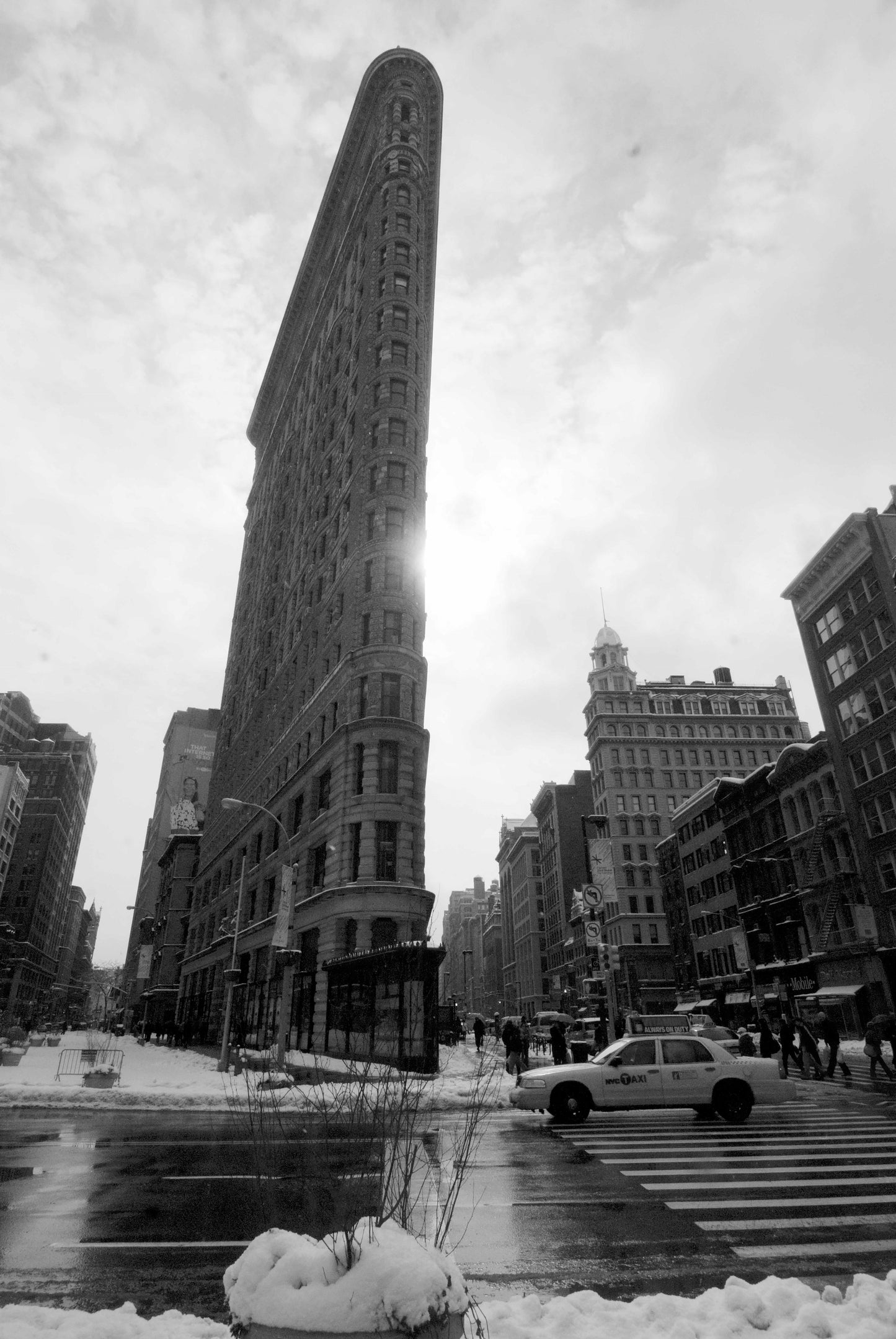 Alessandra Mattanza | LIGHT, Flatiron Building, New York. The iconic Flatiron building stands in the winter sunshine. Available as a print on acrylic glass.